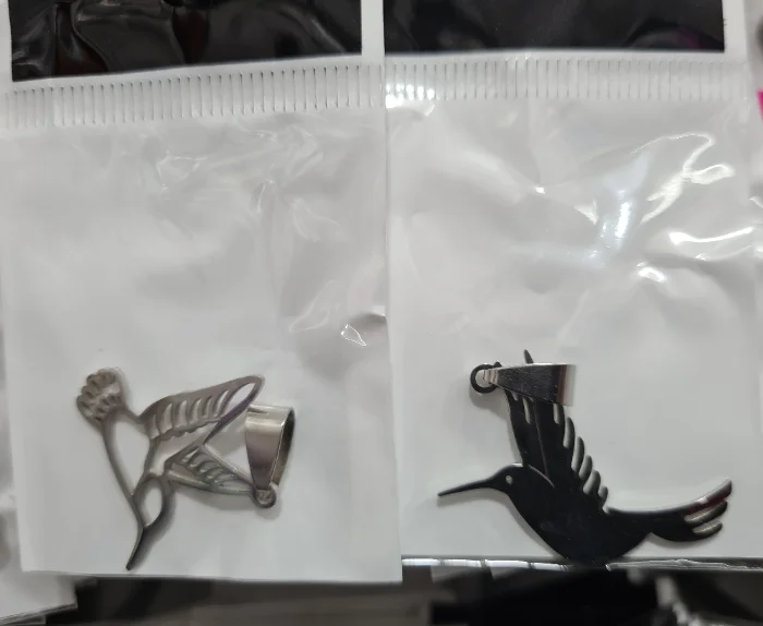 Dijes de Acero Quirúrgico