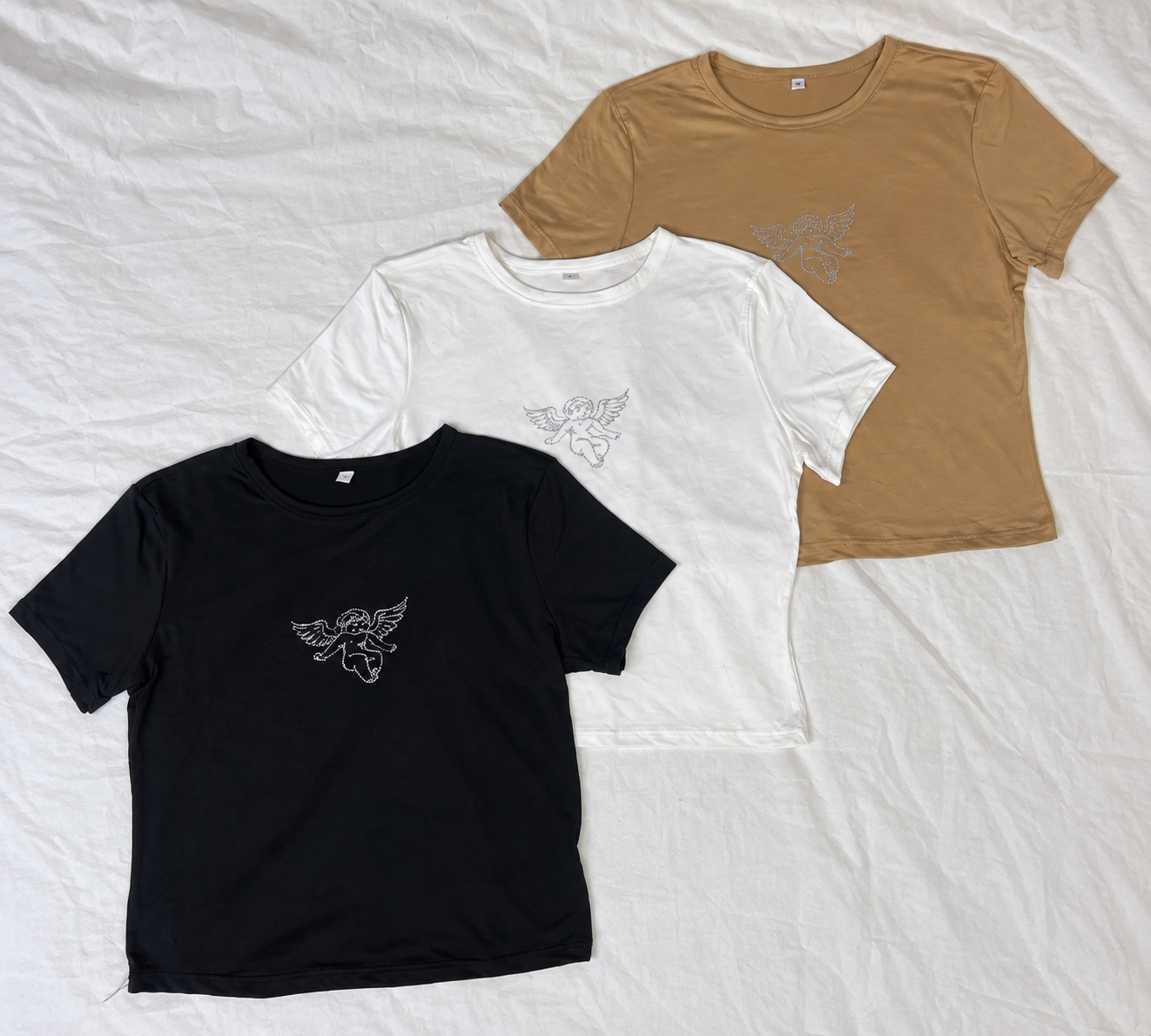 Remera Modal Soft - Tri%CC%81o%20de%20camisetas%20con%20querubines.png