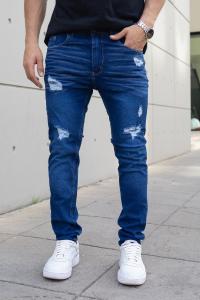 Pantalón Chupin Azul con Roturas..