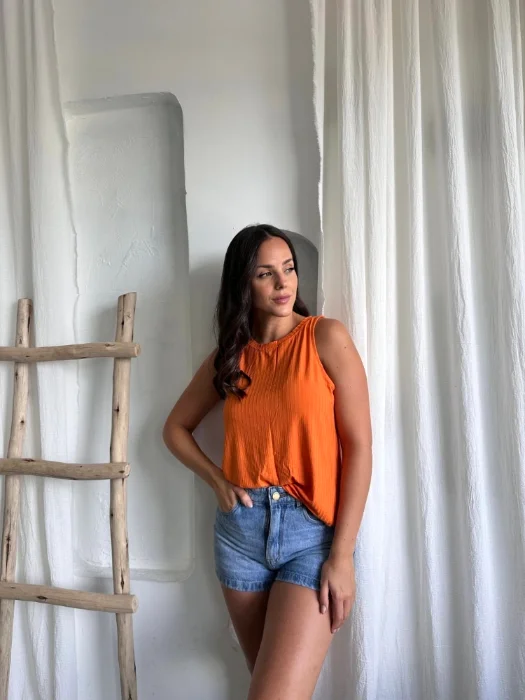 Musculosa Abi