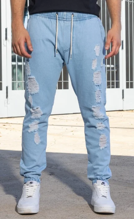 Jogger de Jeans con Rotura y Elastico Arriba y Puño Abajo