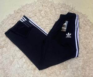 Palazos Adidas Lycra - Miniatura 2