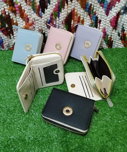 Billetera con Broche de Cuero Pu
 *bimba Lola* 
 Excelente Calidad.