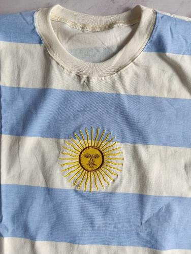 Remeras con Sol Bordado