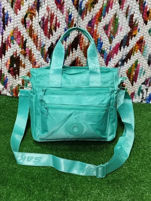 Bolsito Morral
mediano
tela Impermeable Excelente Calidad.