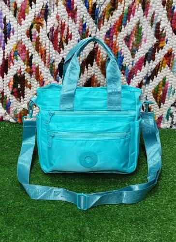 Bolsito Morral
mediano
tela Impermeable Excelente Calidad. - Miniatura 2