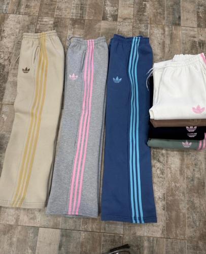 Palazo Adidass Línea Friza Peinada