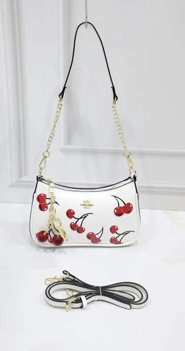 Carterita Morral Coach de Excelente Calidad.
de Cuero Pu.
