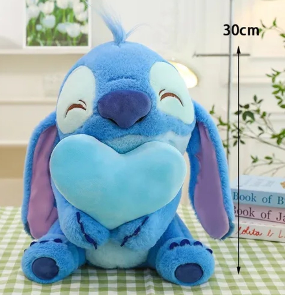 Peluche con Manda de Stitch - Imagen 3