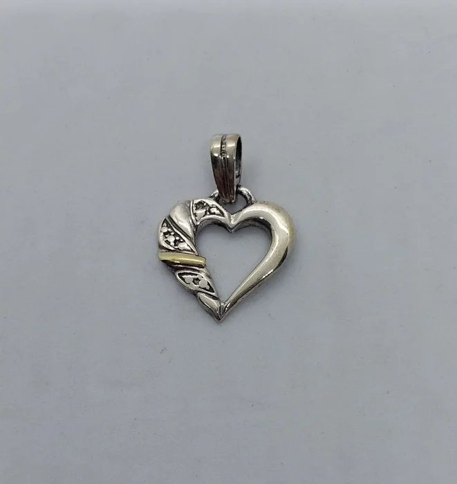 Dije Corazón de Plata y Oro.