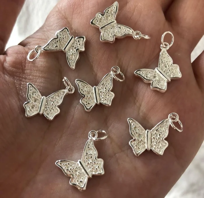 Dije Mariposa de Plata.