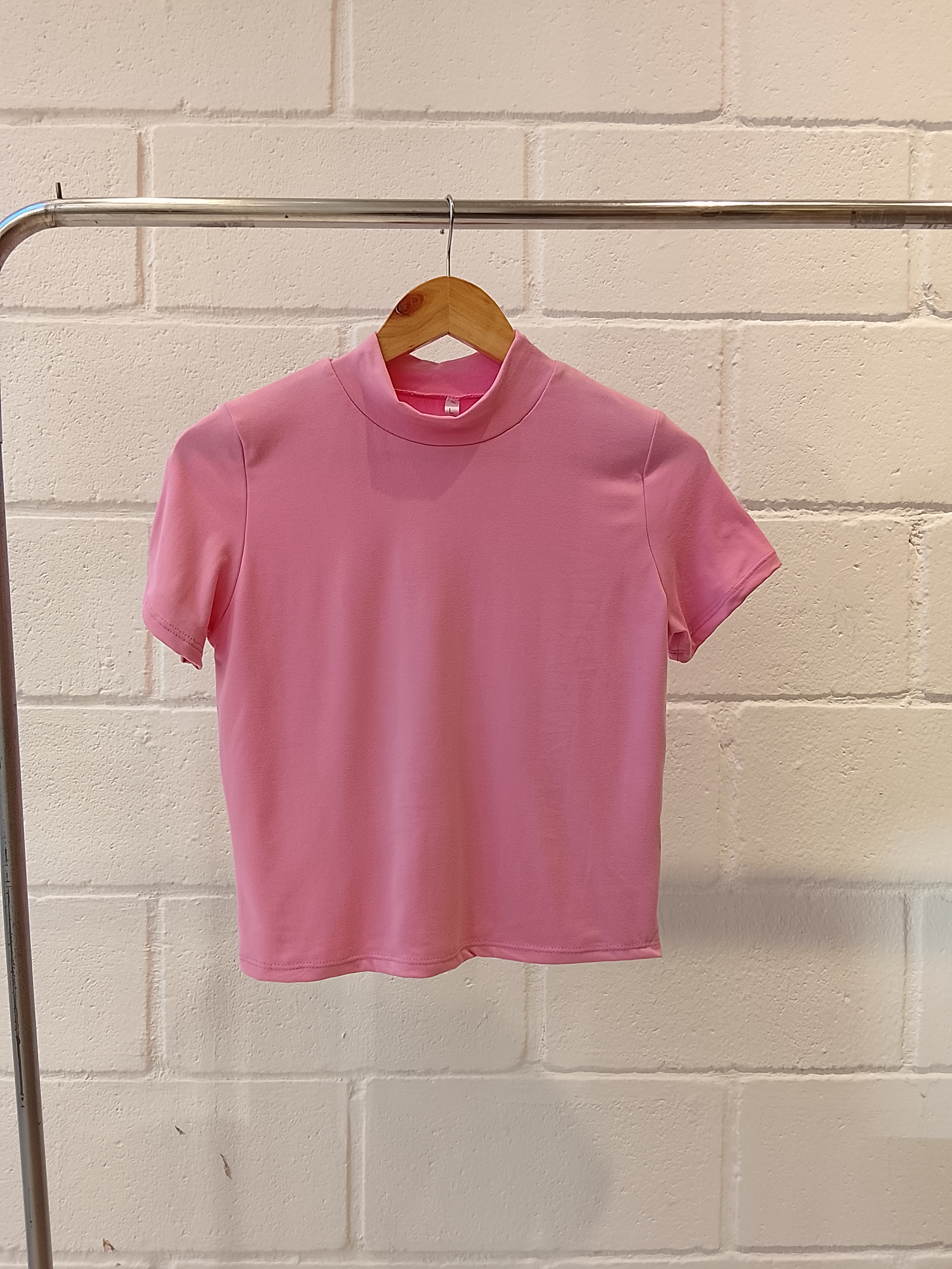 C706 - Remera Eve Semi Polera - IMG_20260828_145326.jpg
