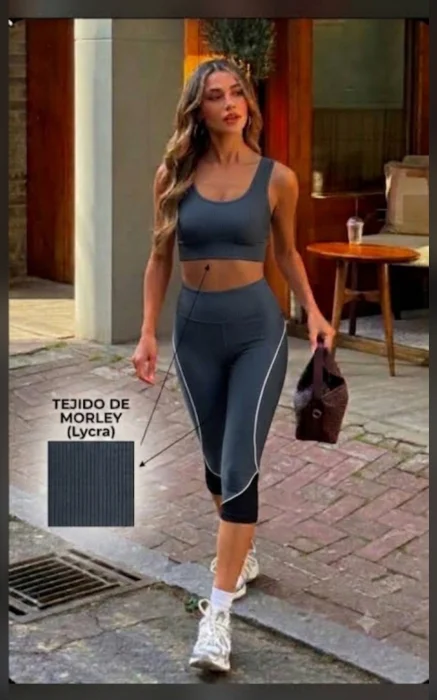 Capri Morley con Tul