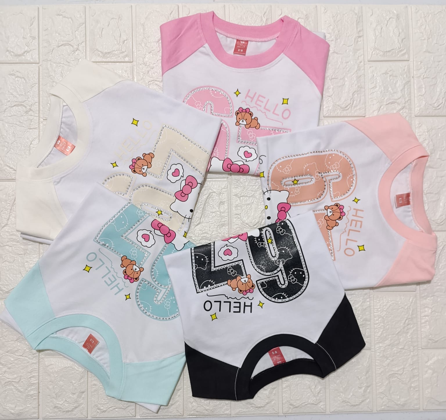 Remera Oversai Strass - f14a0c7e-0e3e-4a6d-9b93-220c7930939c.jpeg
