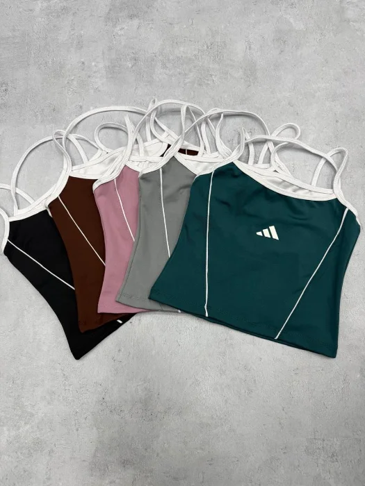 Top Musculosa en Tendencia Adi