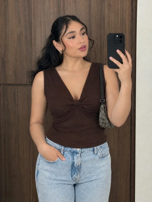 Músculosa Tini