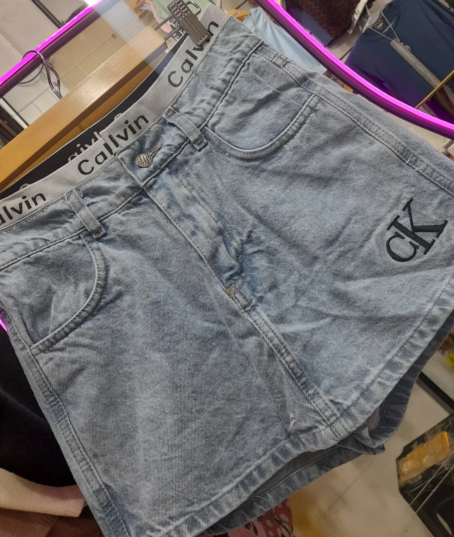 Short Pollera Celeste Ck - Imagen 1