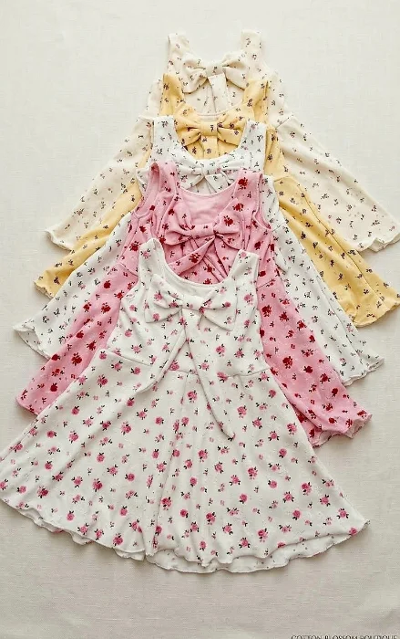 Vestidos  de  Broderi con Moña en la Espalda